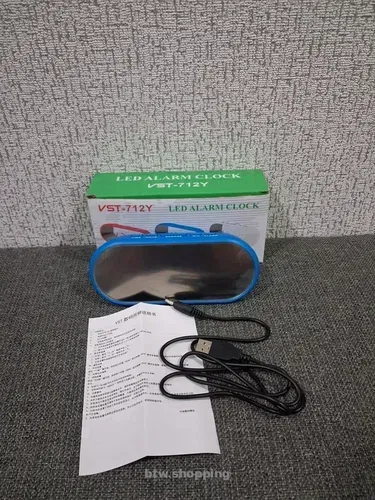 Електронний годинник будильник