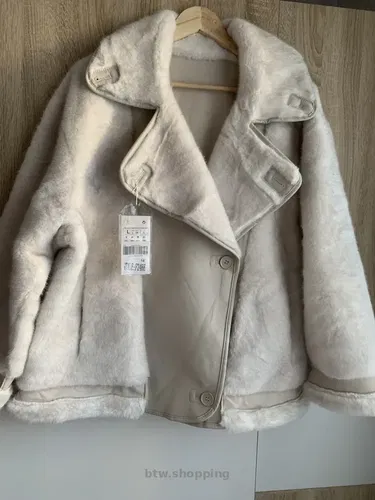 Женская дубленка