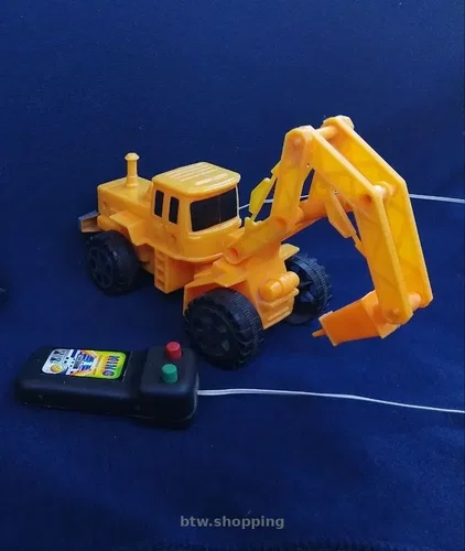 Іграшковий екскаватор на пульті керування для дітей
